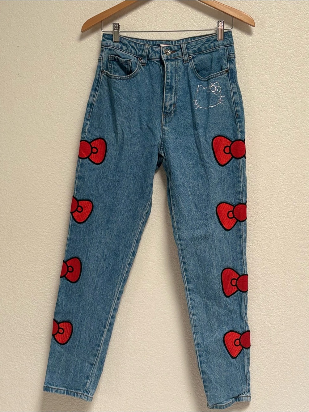 Hello Kitty High-Rise Blue Denim Jeans with Red Bow Patches